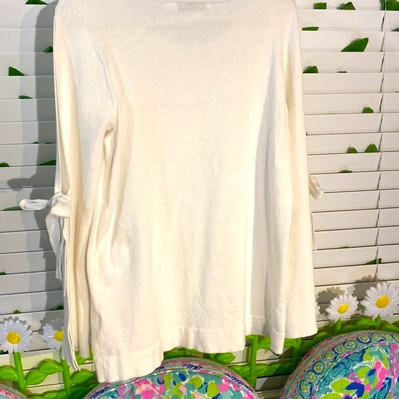 JustFab creamy white sweater top with unique open sleeves tie at the elbows - Picture 3 of 6
